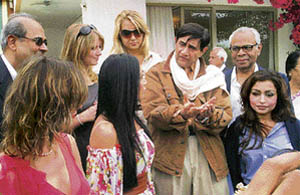 Legendary actor Dev Anand along with business tycoon Srichand Hnduja at a party organised in his honour by the latter at his Cannes villa on Saturday. His film Guide has been screened in the classic section of the film festival.