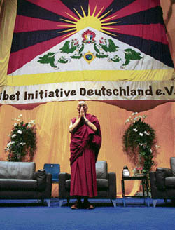 The Dalai Lama arrives for a lecture at Nuremberg in Germany on Sunday. He is here on a five-day visit. 