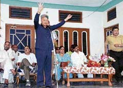 Former Chief Minister Virbhadra Singh addresses a rally in support of Congress candidate from Hamirpur O.P. Rattan at Sai on Monday.