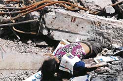 A corpse amid the rubble in Beichuan in southwest Chinas quake-hit Sichuan province on Monday. Hope is fading fast in finding more survivors after the May 12 earthquake caused massive damage and loss of life. 