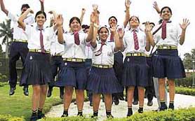 CELEBRATING SUCCESS: Jubilant students of Chaman Vatika School after seeing their result on the website of ICSE Board on the Chandigarh road in Ambala on Tuesday.