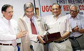 Prof G.K. Chadha, chairman, UGC pay review commission, being honoured by Prof R.C. Sobti, vice-chancellor, Panjab University, at the first meeting of the commission on Tuesday.