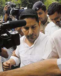 Baljinder Singh Sandhu being produced in the local court in Chandigarh on Tuesday.