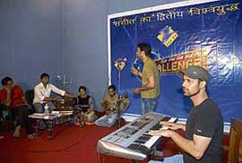 A young Kashmiri boy sings during a Sa Re Ga Ma Pa Challenge 2008 audition test at the Zee bureau office in Srinagar on Tuesday. The audition test is being held for the first time in the valley despite militant threats.