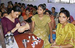 Volunteers learn painting during a 10-day NSS camp at GNN College, Doraha, on Tuesday. 