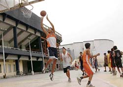 Players attend trials conducted by the Ludhiana District Basketball Association at Guru Nanak Stadium. The selected team would participate in the Junior Punjab State Basketball Championship to be held at Khanna. 