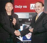 CEO & president, HTC Corp , Peter Chou, (L)with executive director Bharti Airtel, Syed Safawi, at the launch of new mobile phone - HTC Touch Diamond - by HTC Corporation and Airtel in New Delhi