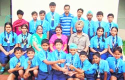 Director of Golden Bells School Col C.S. Bawa with medal winners in Mohali. 