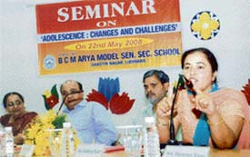 Speakers during a seminar on adolescents at BCM Arya Model Senior Secondary School