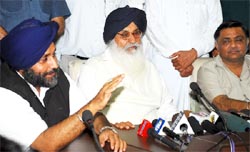 Chief Minister Parkash Singh Badal, SAD chief Sukhbir Badal and BJP minister Manorajan Kalia addressing mediapersons in Bathinda