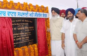 CM Parkash Singh Badal, SAD chief Sukhbir Badal and BJP minister Manorajan Kalia laying foundation stone of water and sewerage plant