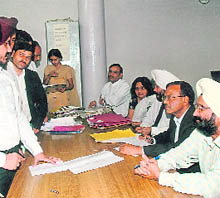 The judges of district courts hold Lok Adalat at district courts in Chandigarh on Saturday.