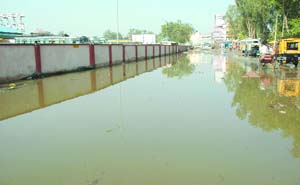 The administration has miserably failed to tackle the problem of waterlogging on the road near the newly-built bus stand, giving commuters a harrowing time.