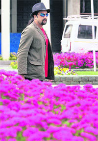 Guitarist Salman Ahmad of the world famous Sufi rock band, Janoon, on his arrival in Srinagar on Saturday. The band will perform at the Sher-e-Kashmir International Convention Centre on Sunday.