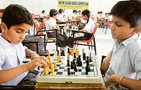 Students participate in the inter-class chess tournament at BVM Senior Secondary School in Ludhiana