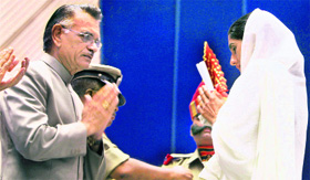 Union home minister Shivraj Patil after presenting an award to the widow of a BSF jawan during the BSF investiture ceremony in New Delhi on Saturday.