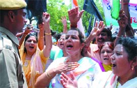 Activists of the All-India Majdoor Congress protest against Brig H.P.S Dhillon for allegedly rigging in the Delhi Cantonment Board elections, at Jantar Mantar in New Delhi on Sunday