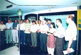 V.K. Sharma, director (technical) of the National Fertilisers Limited, administers the anti-terrorism pledge to employees of the company.