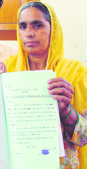 Kesaro with her papers.
