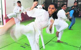 Women hone their skills at a martial arts school in Mumbai