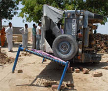 A jeep overturned following violence on the eve of Panchayat elections at Mehna village