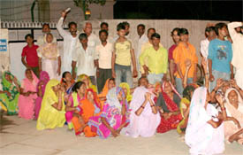 Voters from Dhaani Bashesharnath in Abohar staging dharna at the SDMs residence on Monday night.