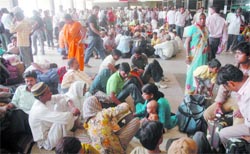 Passengers stranded at the New Delhi Railway Station due to some trains being cancelled in the wake of the protest by Gujjars