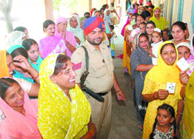 Voters turn out in large numbers to exercise their franchise in Jalandhar on Monday.
