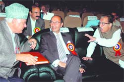 Former J&K chief minister Farooq Abdullah talking to Prof Saifuddin Soz, Union Minister for Water Resources and state Congress president, at the inauguration of the Institute for Kashmiri Studies at the University of Kashmir in Srinagar on Monday