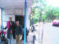 Mahinder Singh (L) with his friend.