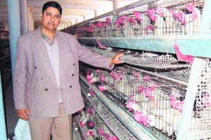 A poultry farmer shows concern over rumours of bird flu at his farm in Una.