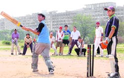 City lads brave the scorching sun to play their favourite sport.