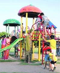 Children enjoy themselves in Atal Park in Karnal on a pleasant Wednesday evening