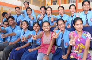 RB DAV Public School students celebrate after the class X results. 