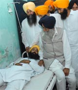 Simranjit Singh Mann, SAD (A) chief, inquiring about the well-being of his party worker at the civil hospital, Bathinda