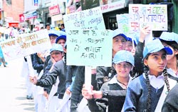 Students from various schools participate in a rally on World No Tobacco Day at the Mall in Shimla