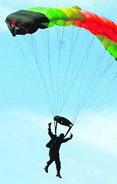 A member of the Indian Air Forces skydiving team, Akash Ganga, performs during the Diamond Jubilee celebrations of the Srinagar Air Force Station in Srinagar on Saturday.