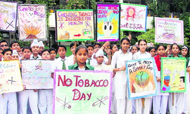 Students of Greenland School at a rally organised on World No Tobacco Day in Ludhiana on Saturday.