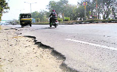 A potholed toll road between Sahnewal and Doraha.