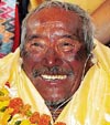 Min Bahadur Sherchan (76), the worlds oldest person to climb Mount Everest, smiles on his arrival in Kathmandu on Saturday.