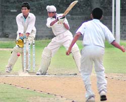 Kuljinder plays a shot during under-15 cricket tournament at St Stephens ground in Chandigarh on Sunday.