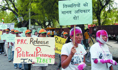 Tibetan activists in exile protest at Jantar Mantar in New Delhi on Saturday demanding release of political prisoners in Tibet.