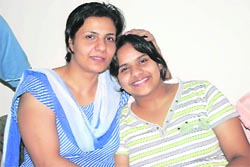 Diyanka Hooda of Model School, Rohtak, who has topped in the CBSE Class X exam in the district by scoring 97.17 per cent marks