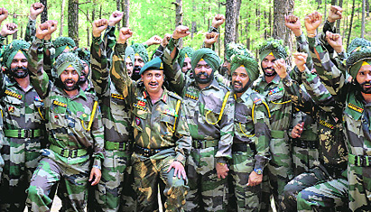 Soldiers of the Sikh Battalion Dashmesh during the 43rd Raising Day celebrations in Rajouri on Sunday. 