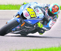 Italian seven-time former world champion Valentino Rossi rides to win his home Moto Grand Prix at Mugello for the seventh time in a row on Sunday.