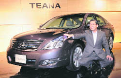 Nissan Motor COO Toshiyuki poses at the launch of new "Teana" in Tokyo on Monday.
