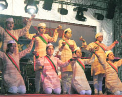 Schoolgirls perform during the Shimla Summer Festival at the Ridge on Monday.