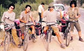 Students of Huanzhong University of Science and Technology, Wuhan City (China), during the Indian leg of their journey on the National Highway in Mandi Ahmedgarh on Monday.