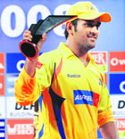Chennai Super Kings skipper MS Dhoni with the runners-up trophy at the presentation ceremony after the IPL T20 final match at the D Y Patil Sports Stadium, Nerul in Mumbai on Sunday.