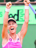 Russian player Elena Dementieva celebrates after winning against compatriot Vera Zvonareva during their French Open fourth round match at Roland Garros, on Monday in Paris.